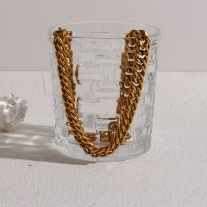 Close-up of gold plated stainless steel chunky link chain with OT toggle clasp detail