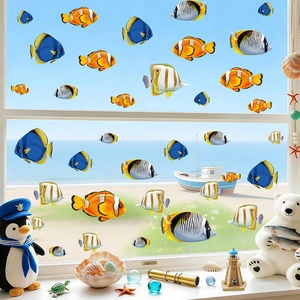 Tropical fish PVC wall stickers showing clownfish and ocean motifs on glass windows