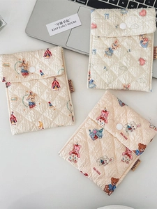 Quilted cream pouch with cute cartoon bears and elephants for makeup or sanitary storage