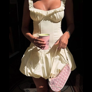 Elegant off-shoulder bubble hem mini dress in cream with corset waist design