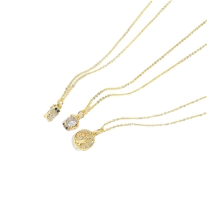 Three gold minimalist necklaces featuring life tree and cubic zirconia charms for women