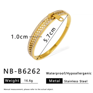 Detail view of 1.0cm wide gold stainless steel zipper bracelet with rhinestone accents