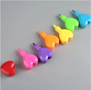 Close-up of six colorful heart-shaped highlighters in vibrant neon plastic finishes