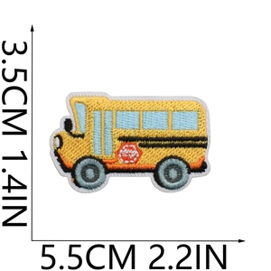 Close-up of yellow school bus embroidery patch showing dimensions 5.5x3.5cm for kids clothes