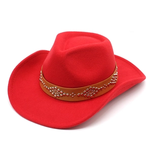 Detailed top view of red cashmere felt cowboy hat with silver rivets and leather band