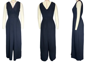 Detail of navy sleeveless jumpsuit featuring V-neckline and high-waist wide-leg design