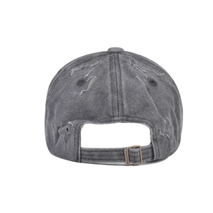 Detail view of washed denim baseball cap featuring vintage adjustable metal buckle back