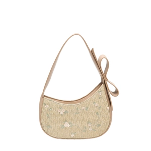 Summer woven straw crescent handbag with floral embroidery and side bow detail