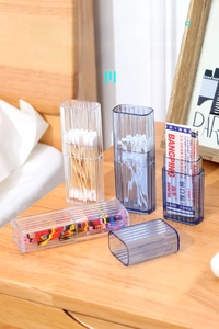 Detail view of transparent ribbed storage box for cotton swabs and jewelry accessories
