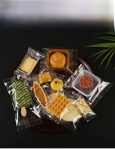 Macro shot of assorted food-grade transparent packaging bags for snacks and pastries