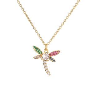 Detailed close-up of a golden dragonfly pendant with vibrant multi-colored zircon stones