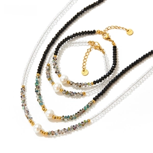 Detail of stainless steel clasp and extender chain on black spinel pearl necklace set