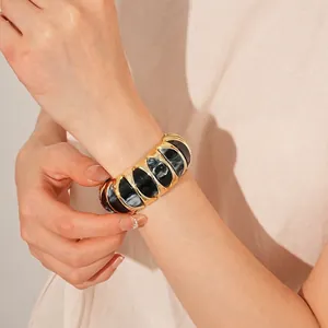 Retro wide elastic bracelet featuring gold metal frames and gray marble resin stones