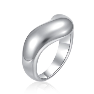 Macro side view of a minimalist silver stainless steel ring with polished curved surface
