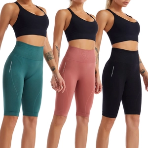 High-waisted seamless athletic shorts for women in green, red, and black colors