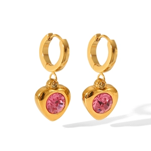 Detail of 18K gold stainless steel hoop earrings with pink zircon heart pendant
