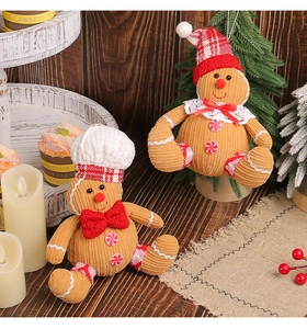 Detailed view of gingerbread man plush ornaments in brown corduroy for Christmas decor