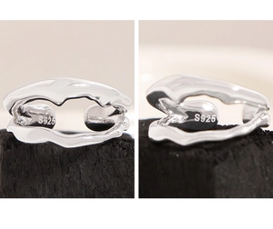 Detailed macro view of S925 sterling silver stamp on the inner double-layer ear cuff