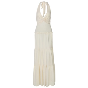Detail of white V-neck halter dress featuring pleated bodice and ruffled layered hemline