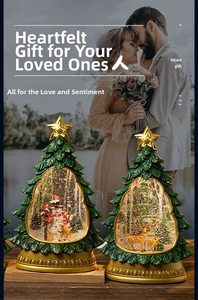 Illuminated Christmas tree snow globe with deer miniature and gold embossed base