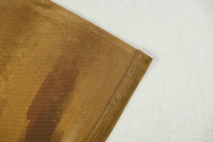 Close-up of double-needle stitching and velvet fabric on the slim print dress
