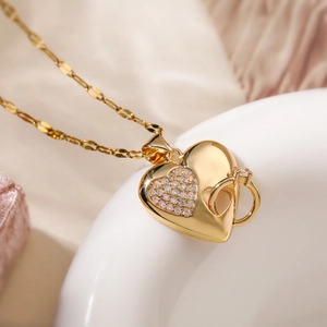 Elegant 18K gold plated copper heart pendant necklace with zircon and ring charm