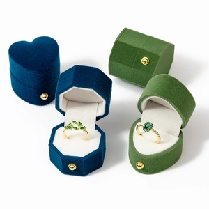 Octagon and heart velvet jewelry boxes in navy and green with metal clasps