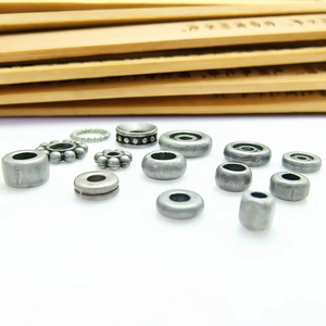 Silver-gray metallic spacer beads in various shapes for DIY Buddhist jewelry crafting