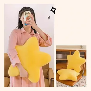 Soft yellow star-shaped plush pillow cushion with a fluffy minimalist Nordic design