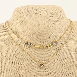 Double-layered gold necklace with rectangular zircons and heart-shaped pendant