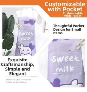 Detail of purple cartoon apron featuring sweet milk cow print and large front pocket