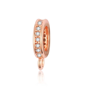 Detail of rose gold micro-pave cubic zirconia pendant connector with bail attachment