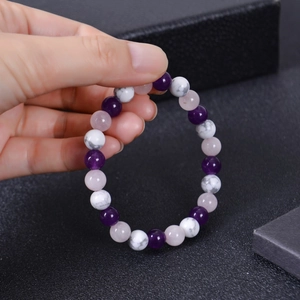 Beaded stretch bracelet featuring amethyst, white turquoise, and rose quartz natural stones