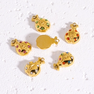 Golden ladybug pendants with colorful rhinestones for DIY jewelry making and crafts