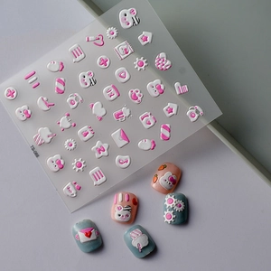 5D embossed nail art stickers with cute pink rabbits and hearts designs on manicured nails