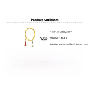 Ethnic yellow glass bead necklace with alloy pendant, 130cm length and red tassel details