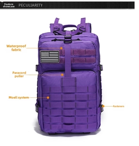 Detail of purple tactical backpack featuring waterproof fabric and MOLLE system