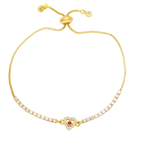 Adjustable heart bracelet with red center stone and clear zircons on gold-tone chain