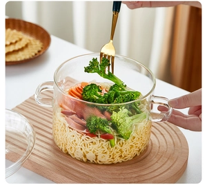 Borosilicate glass pot with double handles used for ramen noodles and healthy meals