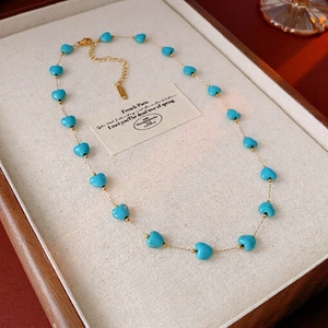 Bohemian heart-shaped turquoise beaded necklace with gold spacers and lobster clasp