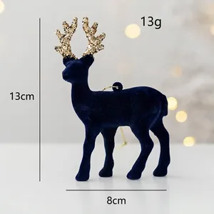 Detailed view of a navy blue flocked Christmas deer figurine with golden glitter antlers