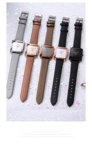 Detailed view of women's vintage square leather watches in multiple colors and finishes