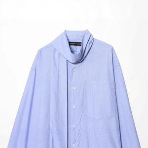 Light blue long-sleeved shirt with fashion bow neck design on a plain white background