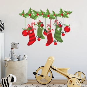 Christmas wall decals with festive socks, red baubles and green leaf vine decorations