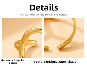 Detailed close-up of hollow heart design and irregular geometric open ring in gold finish