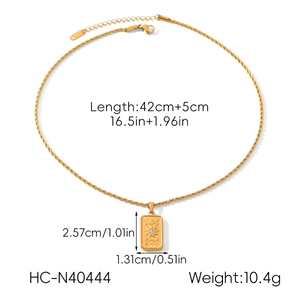 Detail of The Sun tarot pendant showing dimensions 2.57x1.31cm and twisted chain texture