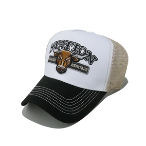 Detail of American retro trucker hat with bull head embroidery and breathable mesh panels