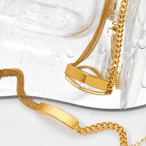 Minimalist multi-layer stainless steel necklace and bracelet set with curved plate