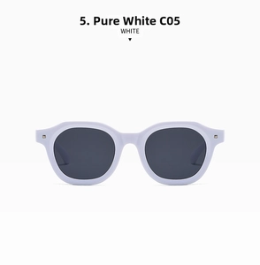 Front view of white geometric sunglasses with grey lenses and silver stud details