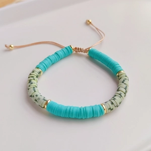 Bohemian multilayer clay bead bracelet with turquoise heishi beads and gold accents